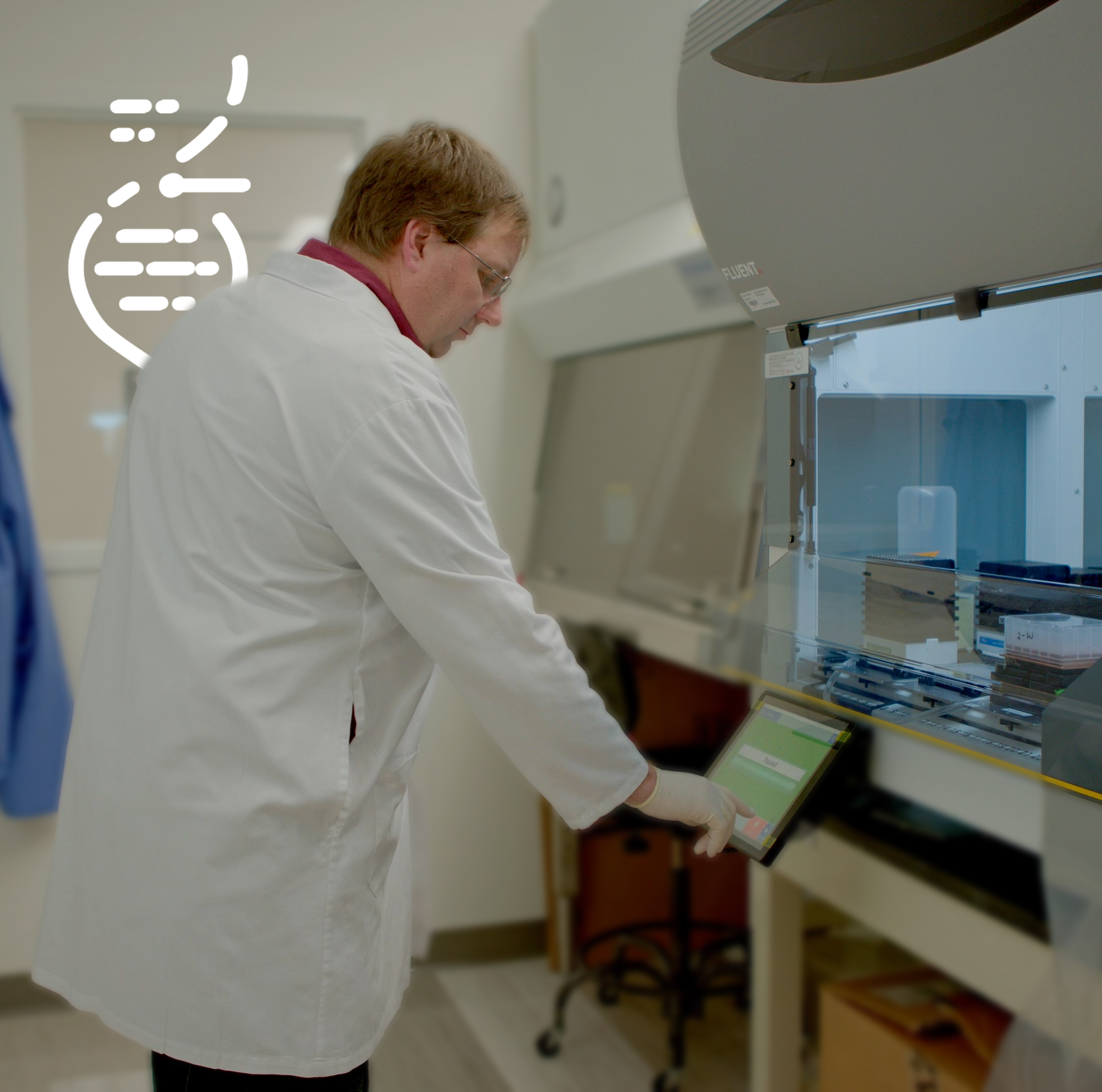 MGI scientist processing Illumina Infinium arrays in the lab